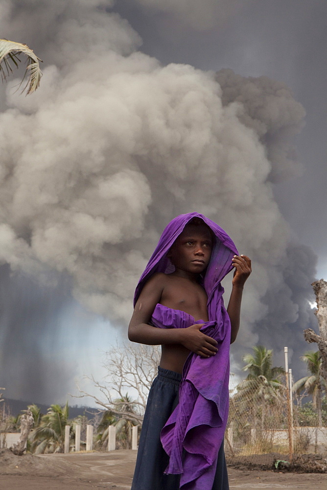 Especially the children suffer from the constant ash fall, Tavurvur Volcano, Rabaul, East New Britain, Papua New Guinea, Melanesia, Pacific