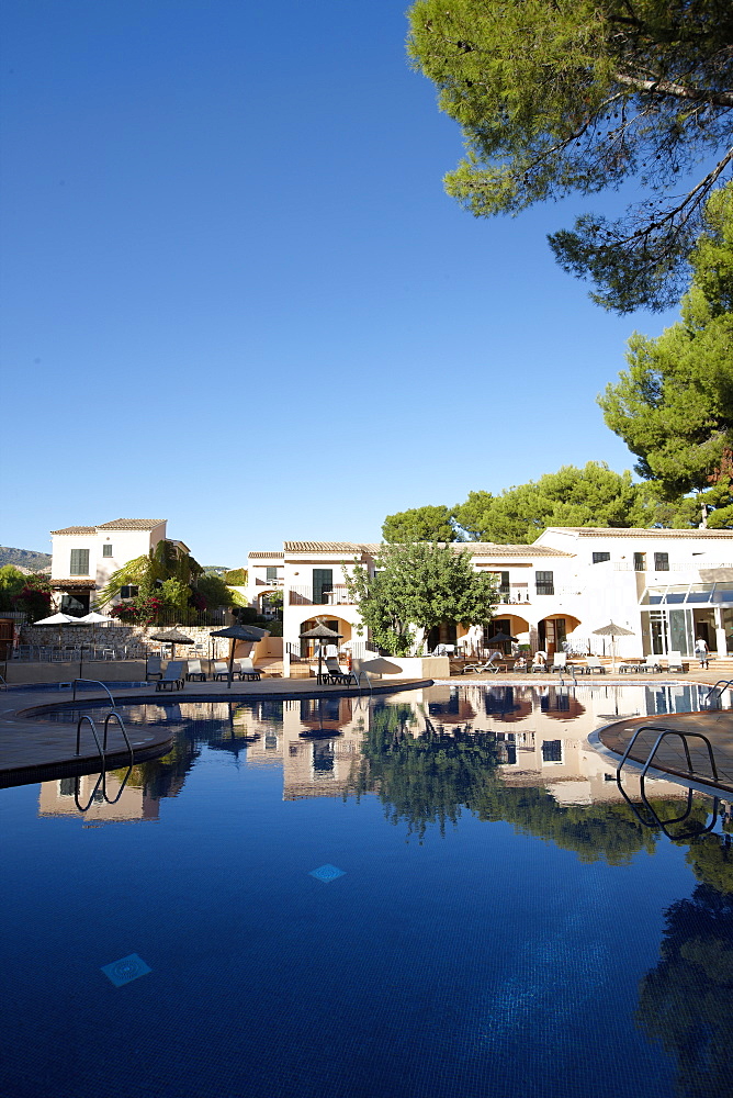 Ducal suites and large hotel pool, Punta Negra H10 Hotel, near Portals Nous, west of Palma, Mallorca, Balearic Islands, Spain