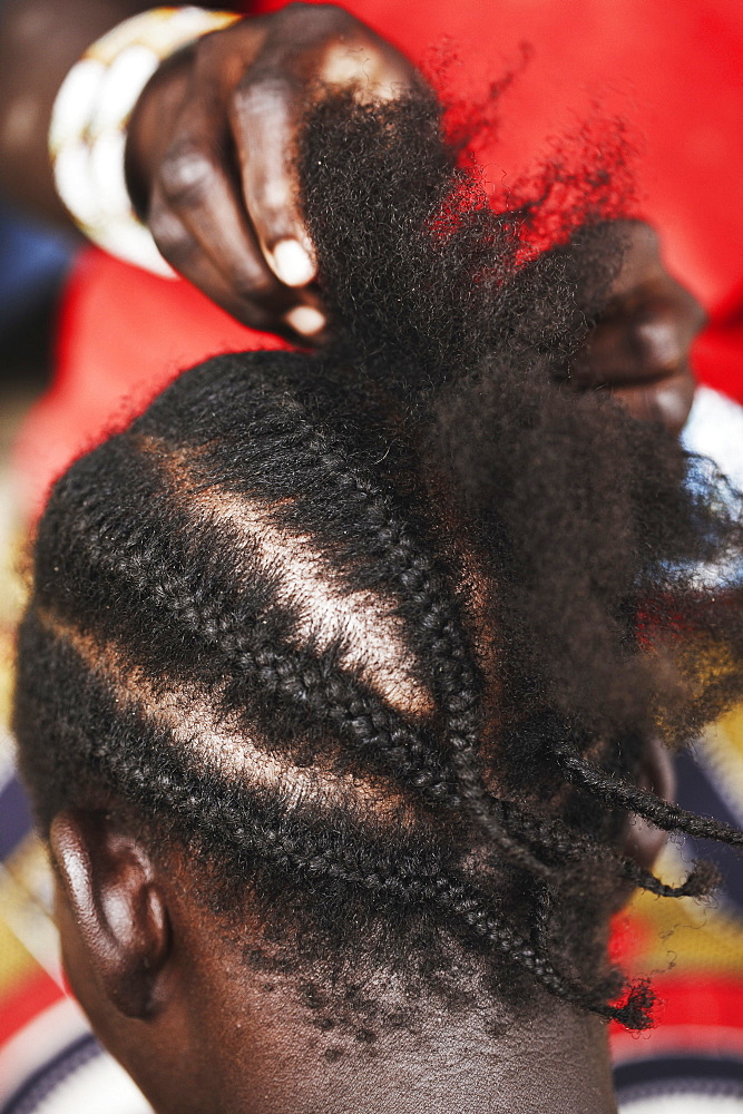 Cornrowing hair, Magadala, Mali