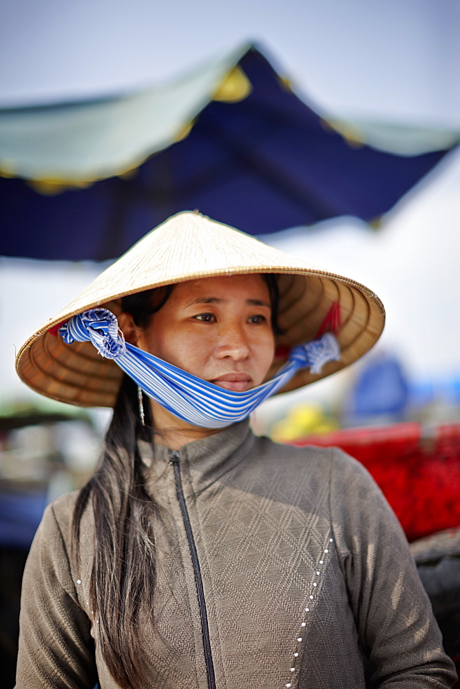 Woman selling coffee, floating market on Mekong river, Long Xuyen, An Giang Province, Vietnam