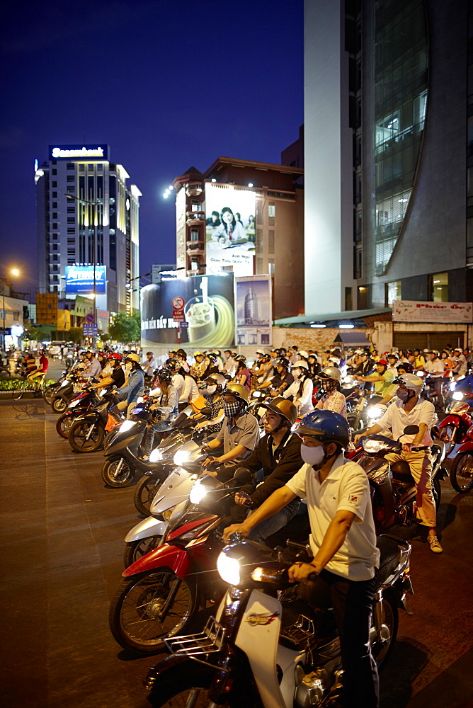 Scooterists at night, Ho-Chi-Minh City, Vietnam