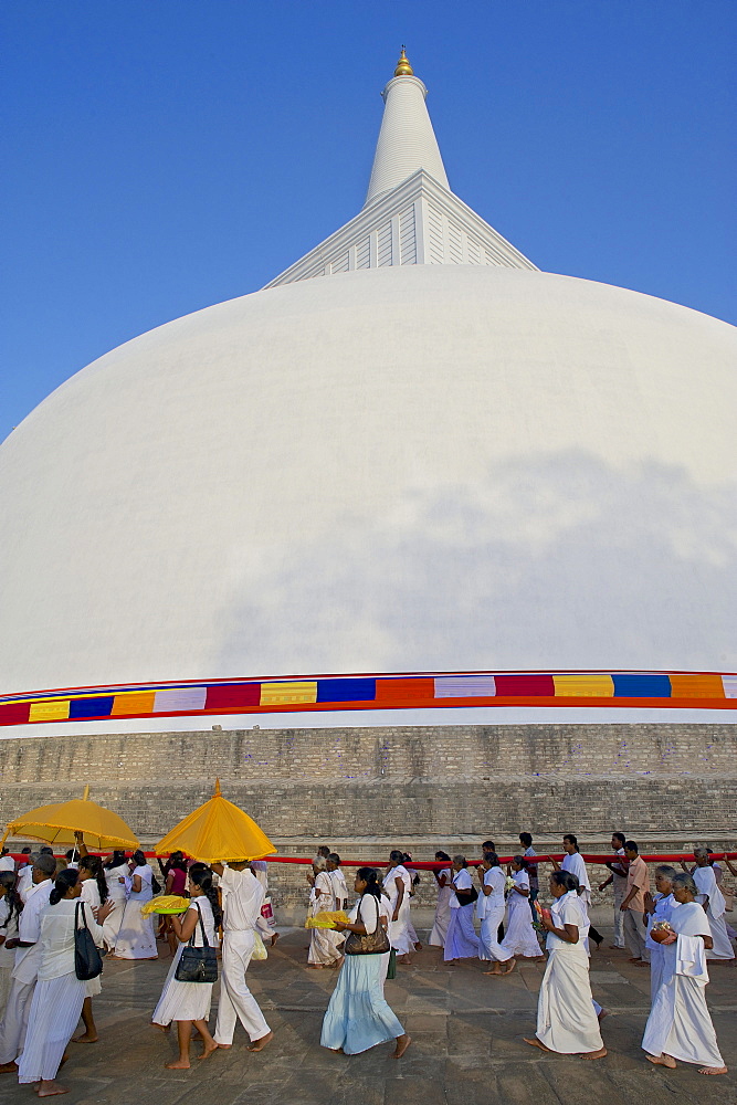 Pilgrims celebrating Poya day at Runaveli Dagoba, Anuradhapura, Cultural Triangel, Sri Lanka