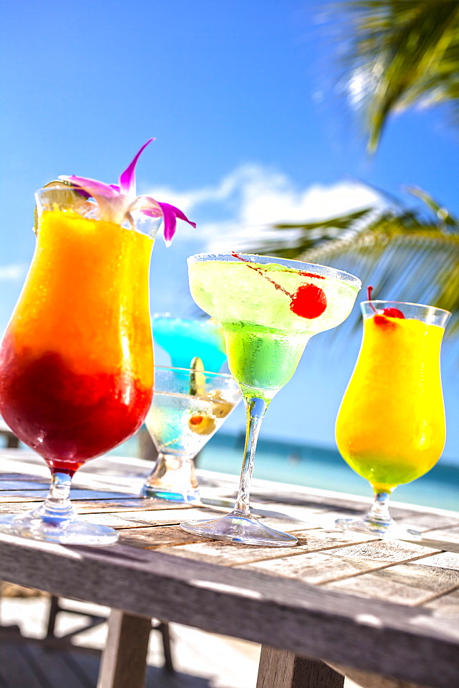 Table with tropical fruit cocktails, Little Palm Island Resort, Florida Keys, USA