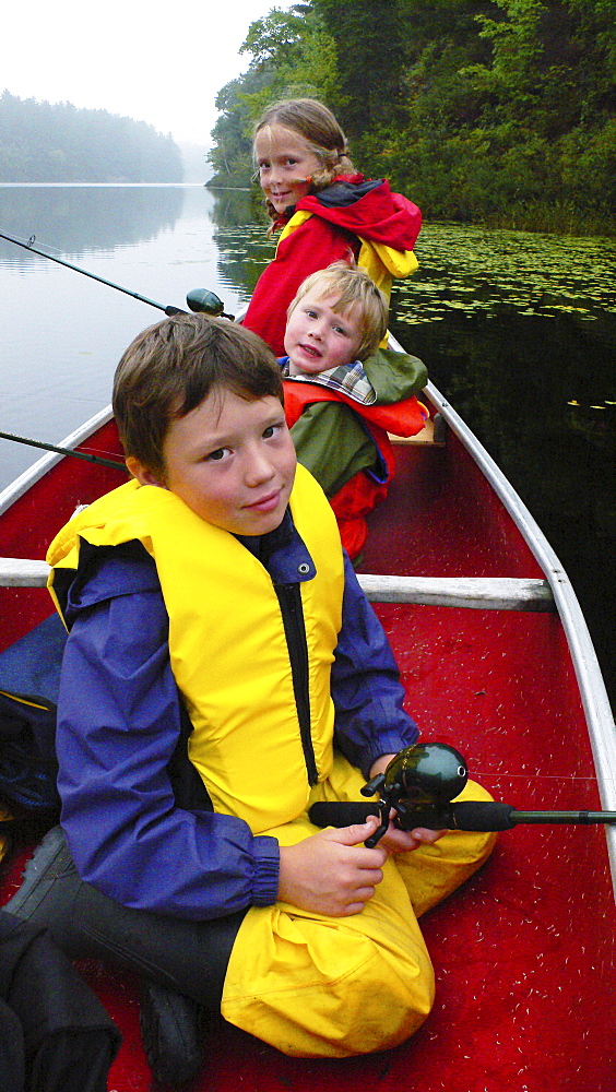 Kids in Canoe Fishing, Bear Paw Lake, Muskoka, Ontario