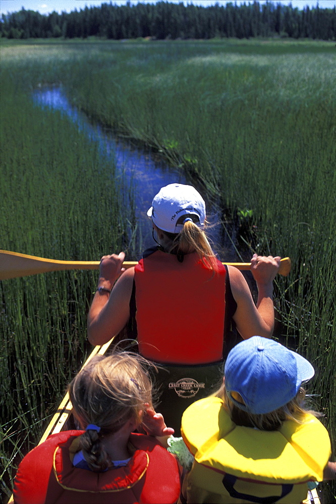 Woman and Girls Canoeing, Northern Ontario