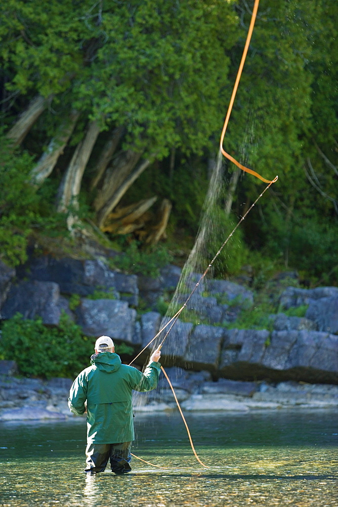 Fisherman on Bonaventure River at Sunrise, Gaspesie Region, Quebec