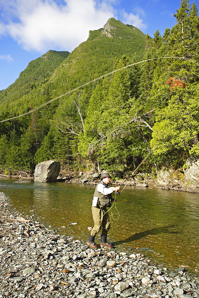 Fisherman on Cap-Chat River, Gaspesie Wildlife Reserve, Quebec