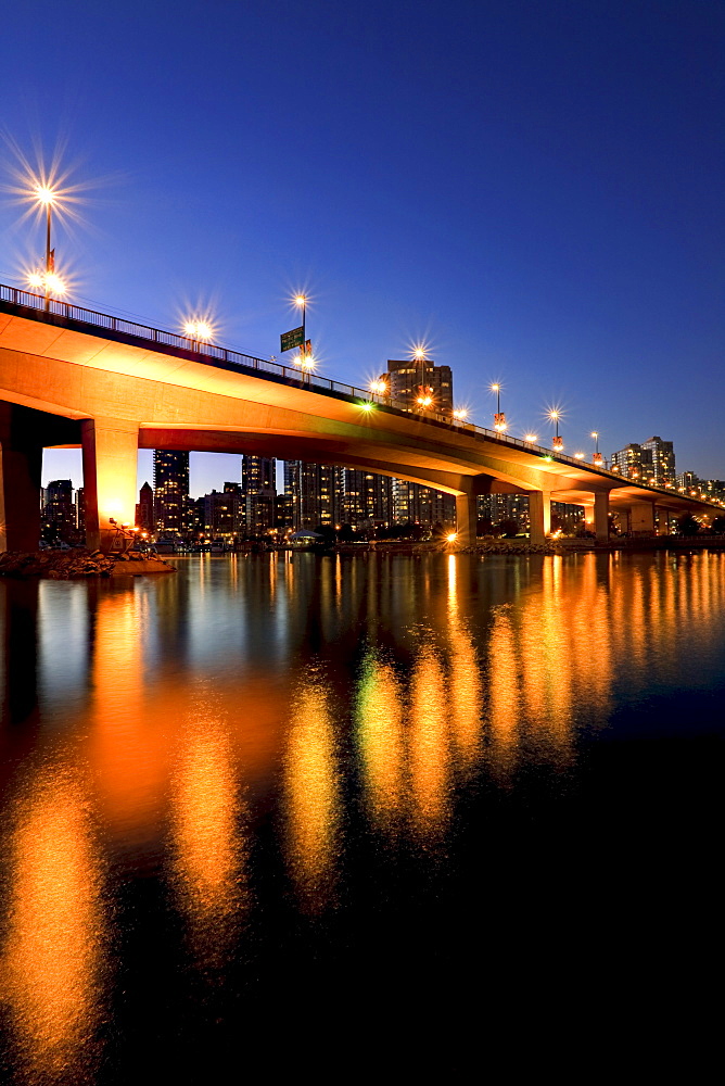 Artist's Choice: View under Cambie Street Bridge from False Creek to condominiums of Yaletown, Vancouver, British Columbia