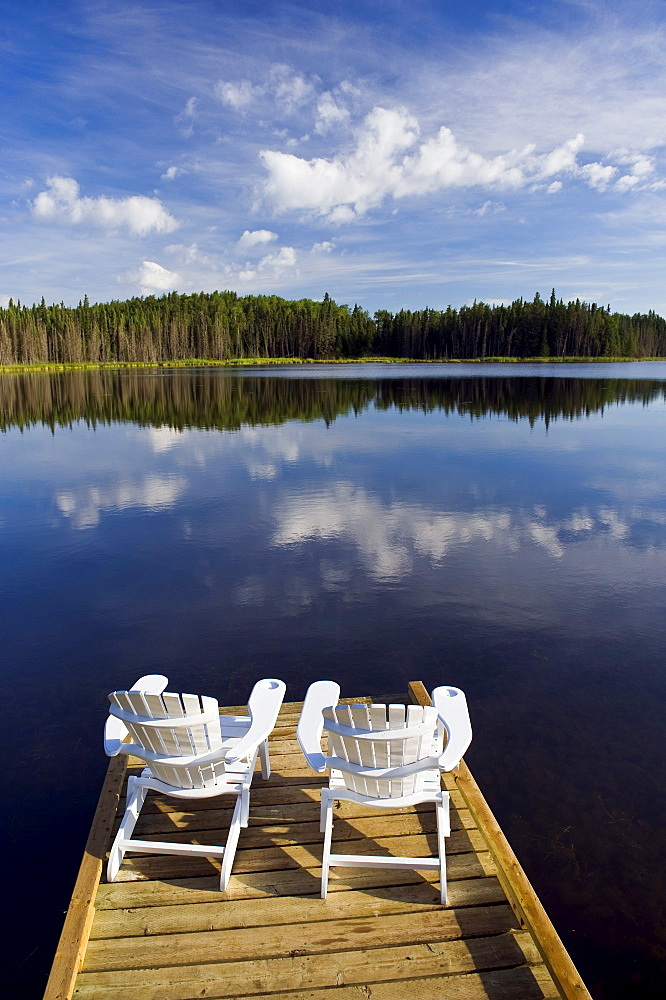 Adirondack chairs on dock, Two Mile Lake, Duck Mountain Provincial Park, Manitoba