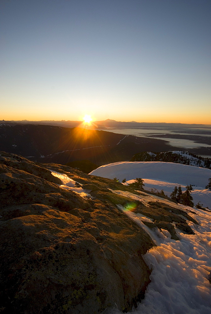 Sunrise over the Lower Mainland, seen from Mt Seymour Coast Mountains, Vancouver, British Columbia