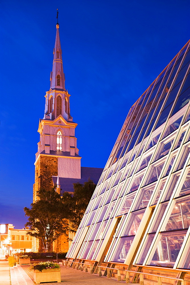 Glass building and Saint-Germain cathedral at dusk, Bas-Saint-Laurent region, Rimouski, Quebec