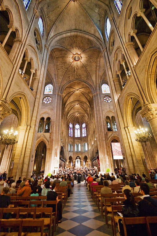 Choir performing during a mass in Notre Dame de Paris Cathedral, Paris, France