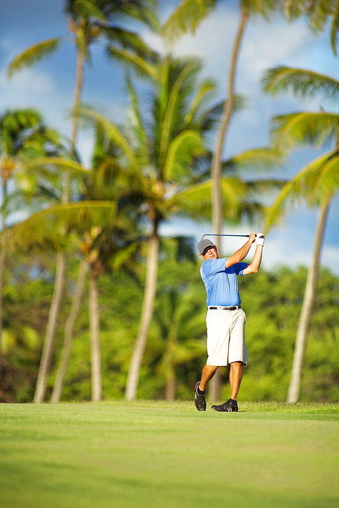 Hawaii, Maui, Maui Country Club, Man enjoys a day of golf during his vacation.