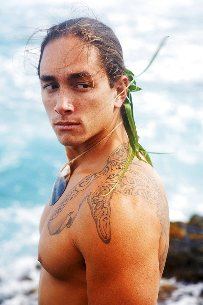 Hawaii, Oahu, Makapuu, Headshot of Polynesian man with traditional tattoos.