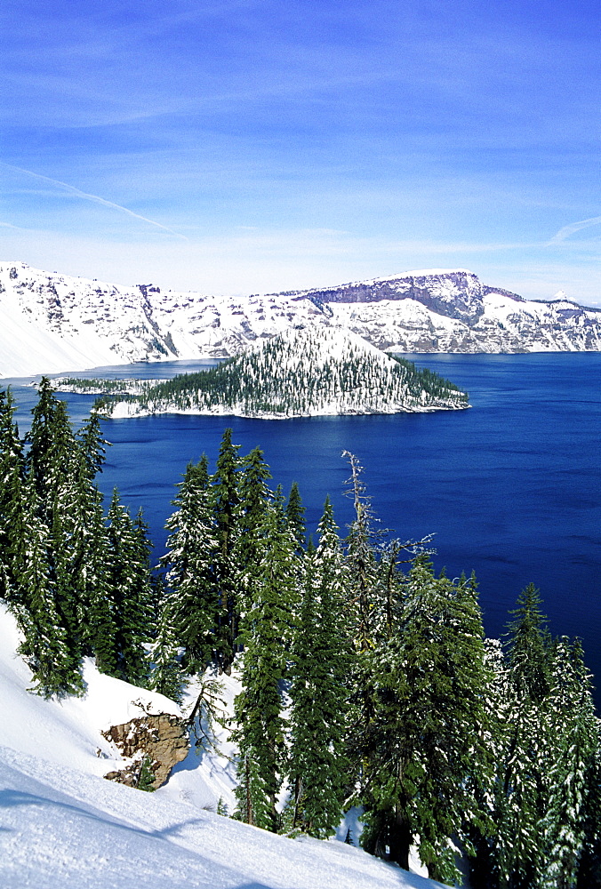 Oregon, Crater Lake National Park, Snowy Crater Lake and Wizard Island.