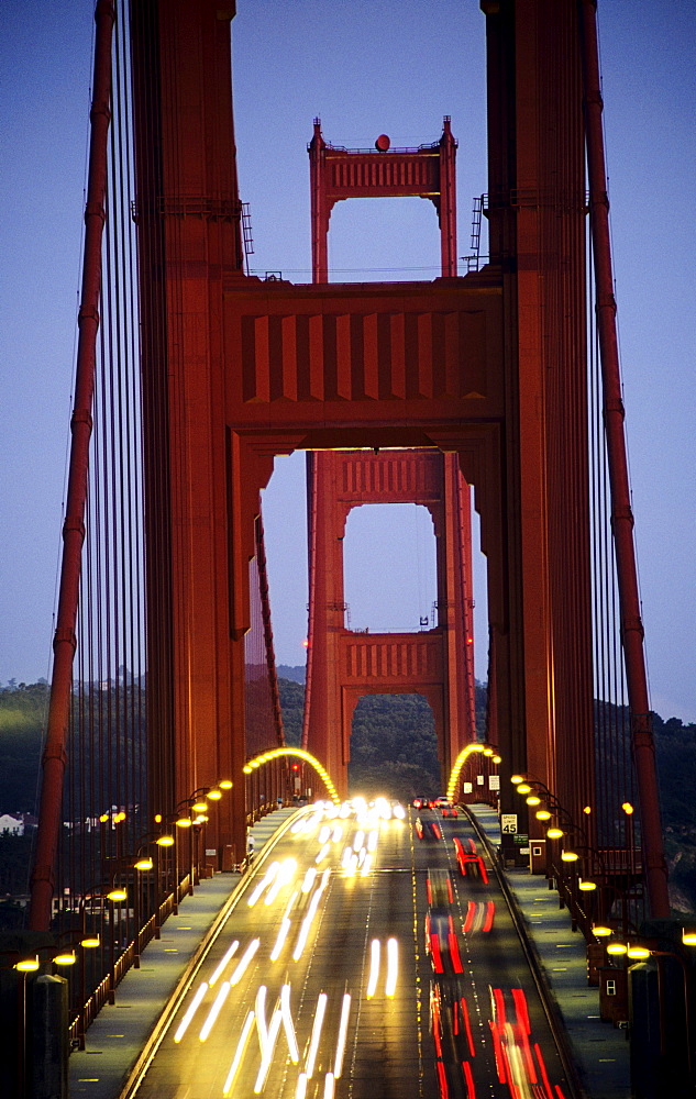 California, San Francisco, Golden Gate Bridge, Blurred traffic lights at evening.