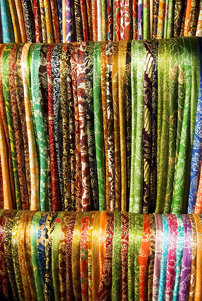 Indonesia, Bali, Ubud, Silk scarves for sale at market.