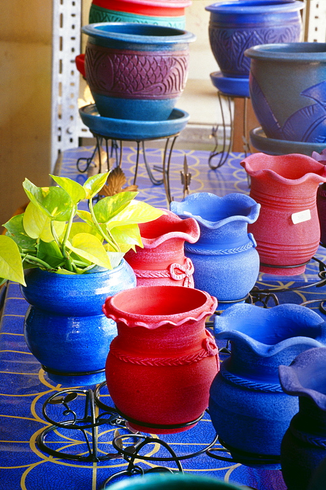 Thailand, Bangkok, outdoor market selling colorful handmade pottery