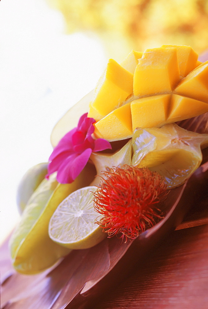 Tropical Fruit with Star Fruit, Lime, Mango, Rambutan and Purple Orchid