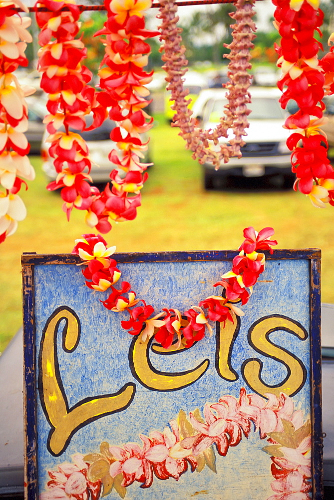 Hawaii, Big Island, Hilo, Lei and flower stand sign