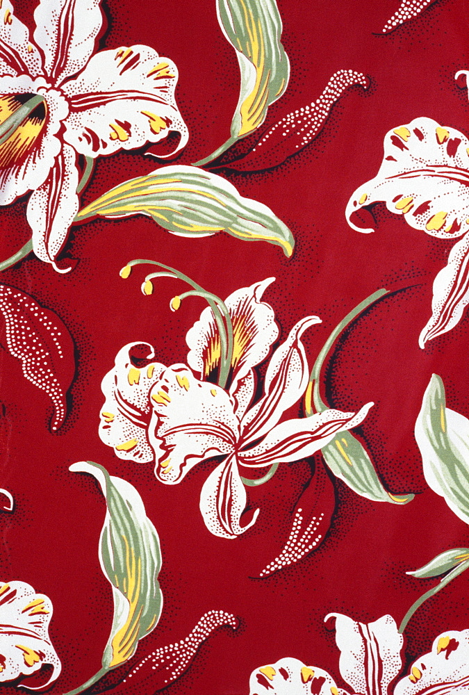 Closeup of red Aloha shirt with orchid flowers