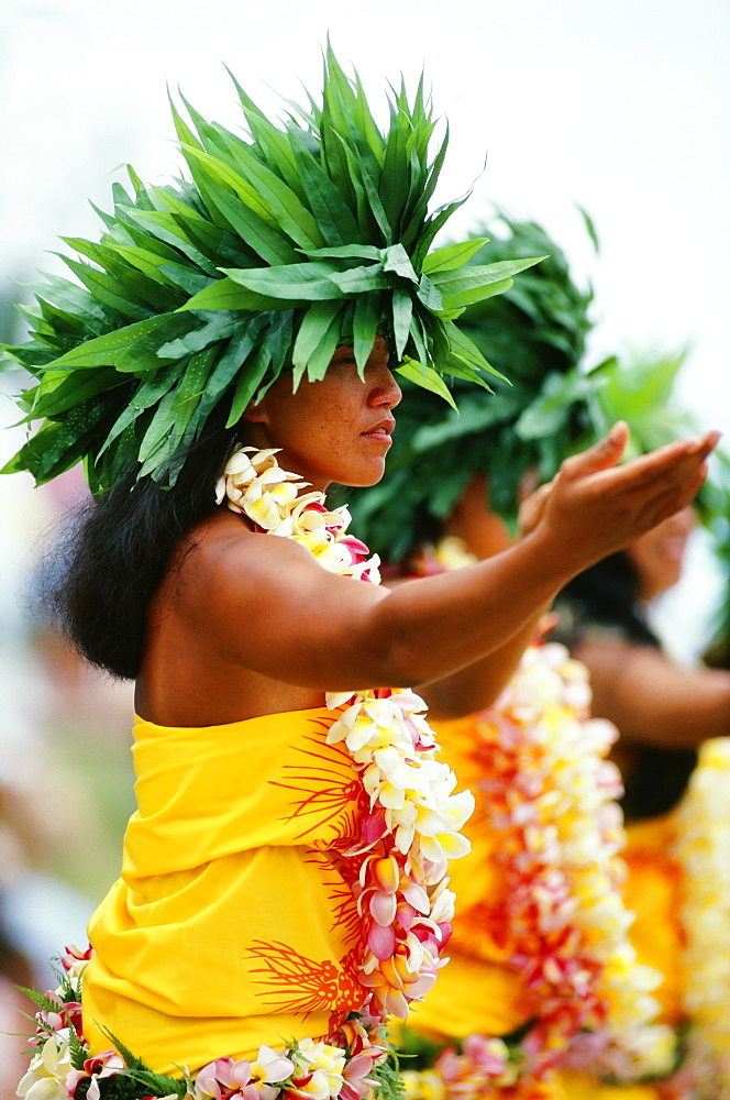 French Polynesia, Bor Bora, Tahitian Dancers In Native Costume, Green Plant Headresses.