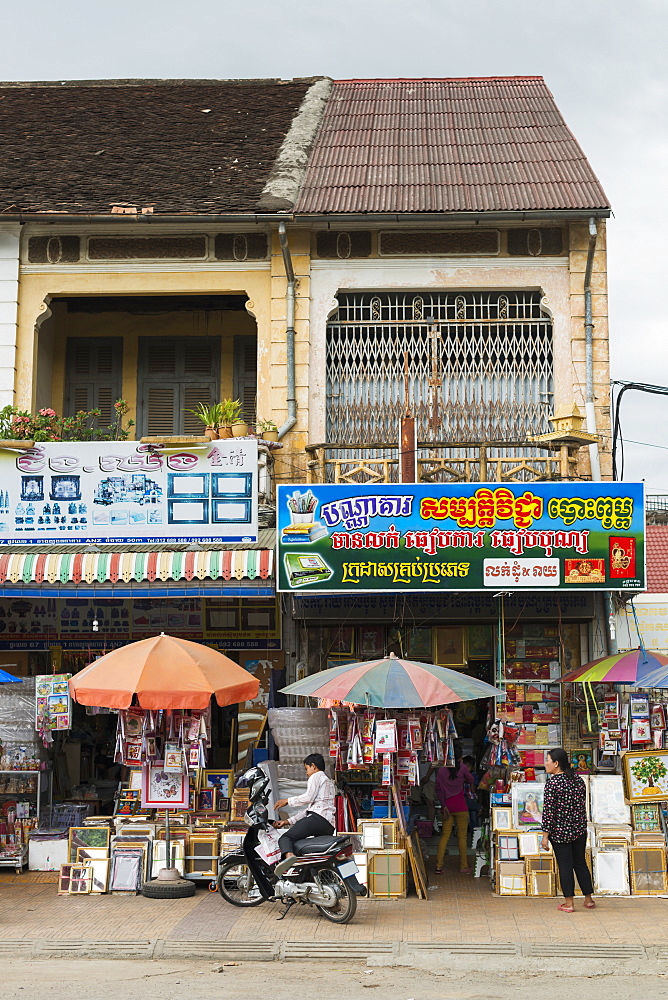 Some shops in Battambang, building in French architectural style, Battambang, Cambodia