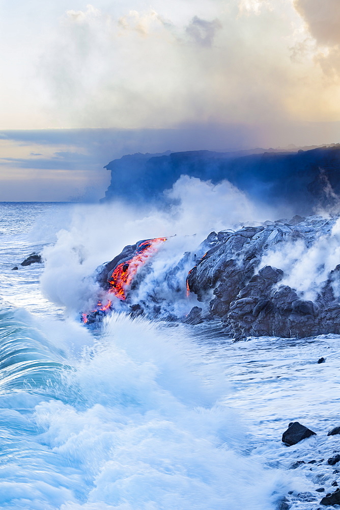 Pahoehoe lava flowing from Kilauea has reached the Pacific ocean near Kalapana, Island of Hawaii, Hawaii, United States of America