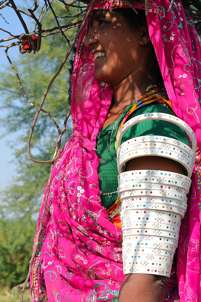 Mir tribal woman with her traditional artificial ivory bangles, Gujarat, India, Asia