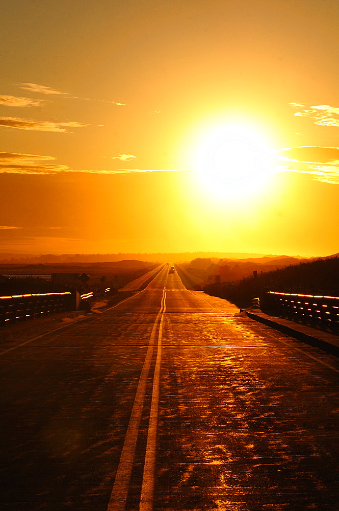 Sunset and highway on Prince Edward Island, Canada, North America