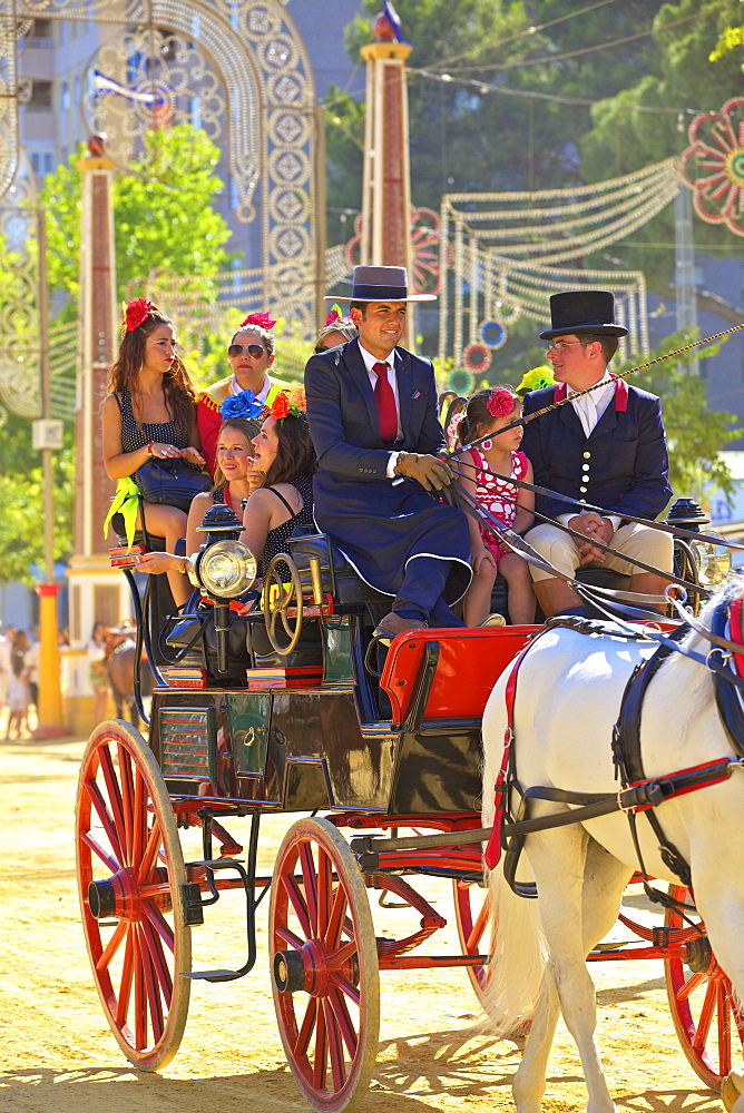 People on horse-drawn carriage, Annual Horse Fair, Jerez de la Frontera, Cadiz Province, Andalusia, Spain, Europe