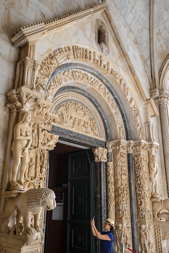 Stone carving outside The Cathedral of St. Lawrence, Trogir, UNESCO Wold Heritage Site, Croatia, Europe