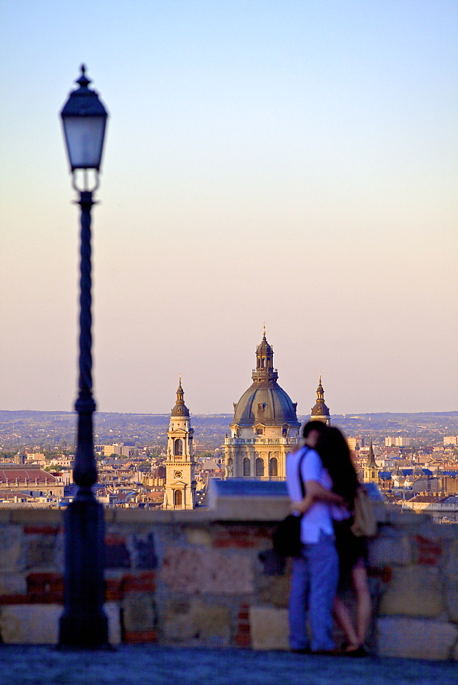 Couple looking at view over the city from Buda Castle, Budapest, Hungary, Europe 