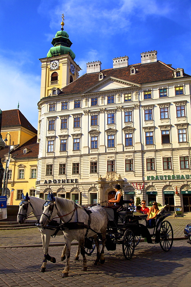 Horse drawn carriage in Freyung Square, Vienna, Austria, Europe