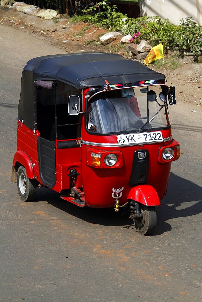 Red tuk-tuk, Matale, Sri Lanka, Asia