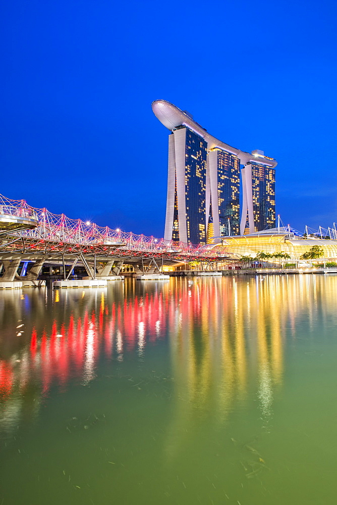 Marina Bay Sands Hotel and the Double Helix Bridge at night, Singapore, Southeast Asia, Asia