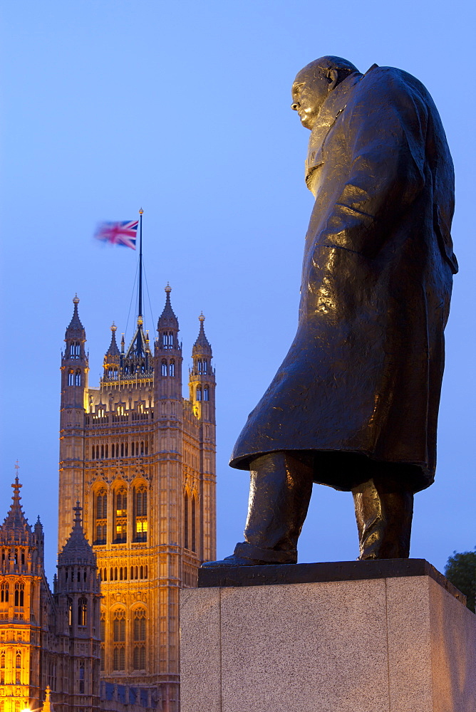 Winston Churchill statue and the Houses of Parliament at night, London, England, United Kingdom, Europe 