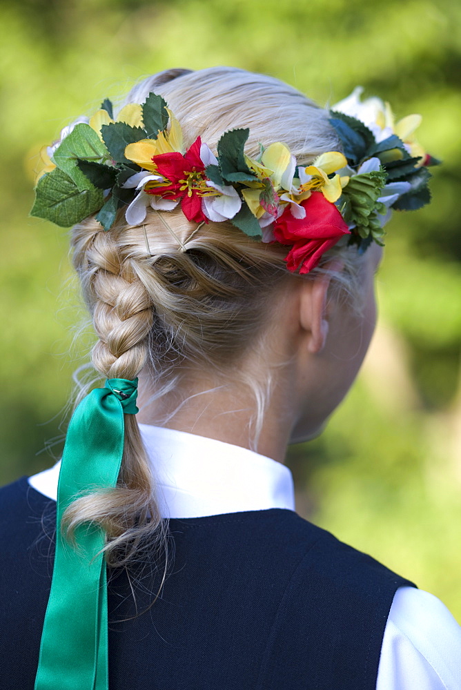 Head dress detail of young woman in Folk Costume, Riga, Latvia, Europe