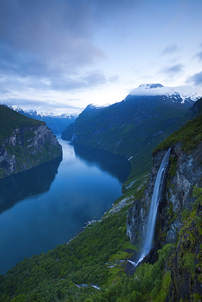 The dramatic Geiranger Fjord illuminated at dusk, UNESCO World Heritage Site, More og Romsdal, Norway, Scandinavia, Europe 