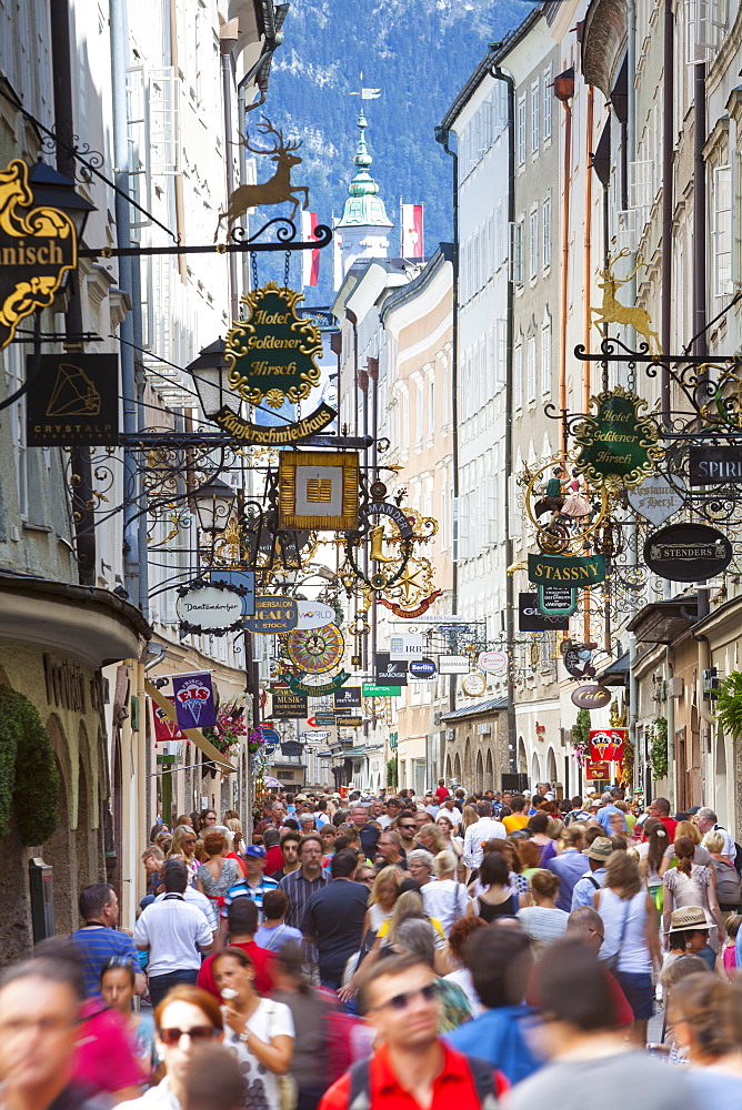 Ornate shop signs on Getreidegasse, Salzburgs bustling shopping street, Salzburg, Salzburger Land, Austria, Europe