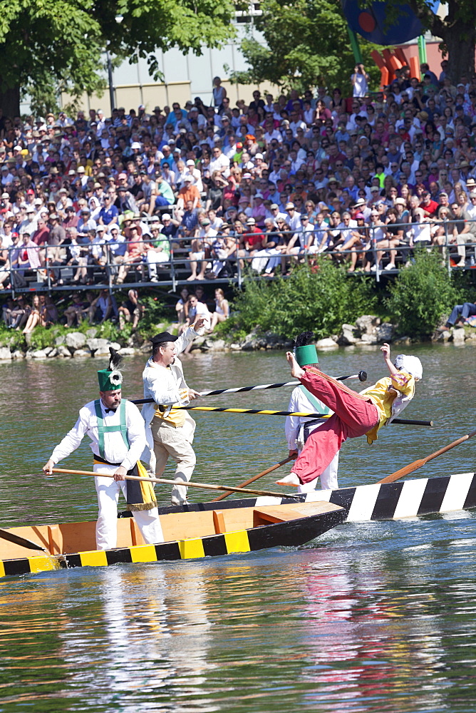 Historical characters on a boat during the contest on the Danube River, Fischerstechen, Ulm, Baden Wurttemberg, Germany, Europe