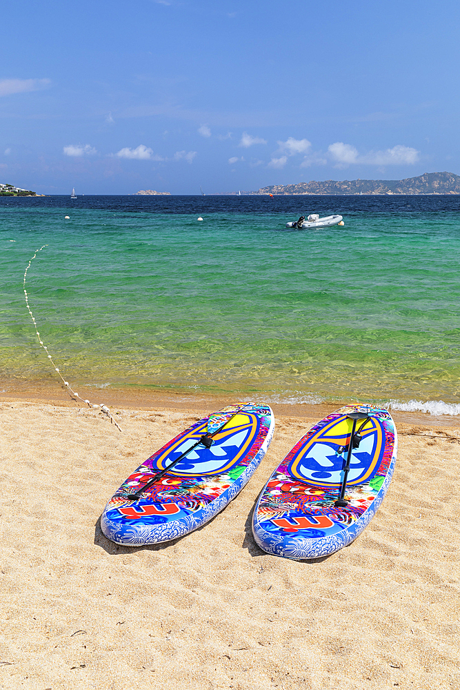 Brightly coloured paddleboards, Porto Pollo Beach, Porto Puddu, Gallura, Sardinia, Italy, Mediterranean, Europe