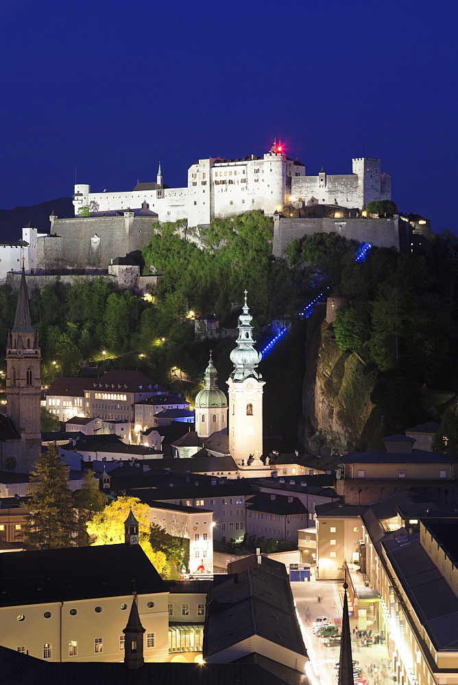 High angle view of the Old Town, UNESCO World Heritage Site, with Hohensalzburg Fortress and Dom Cathedral at dusk, Salzburg, Salzburger Land, Austria, Europe 