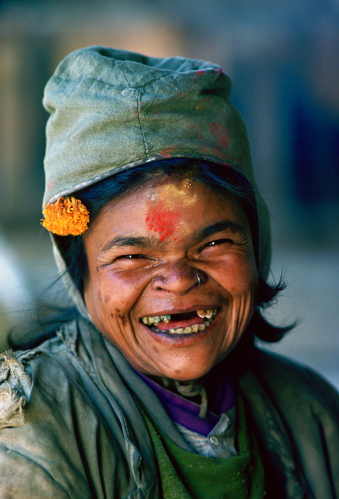 A holy woman laughing at Pashupatinath Hindu Temple in Nepal