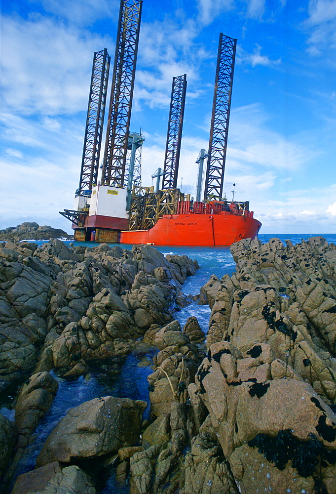 Oil rig aground in Grandes Rocques Bay, Guernsey, Channel Islands