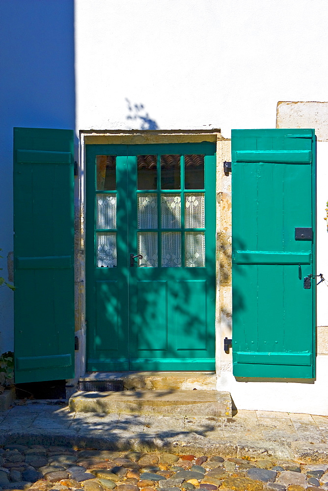 Traditional door and shutters, Ile De Re, France.