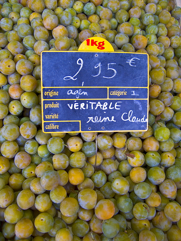 Greengages, Reine Claudes, on sale in a  food market in Ars en R?, France