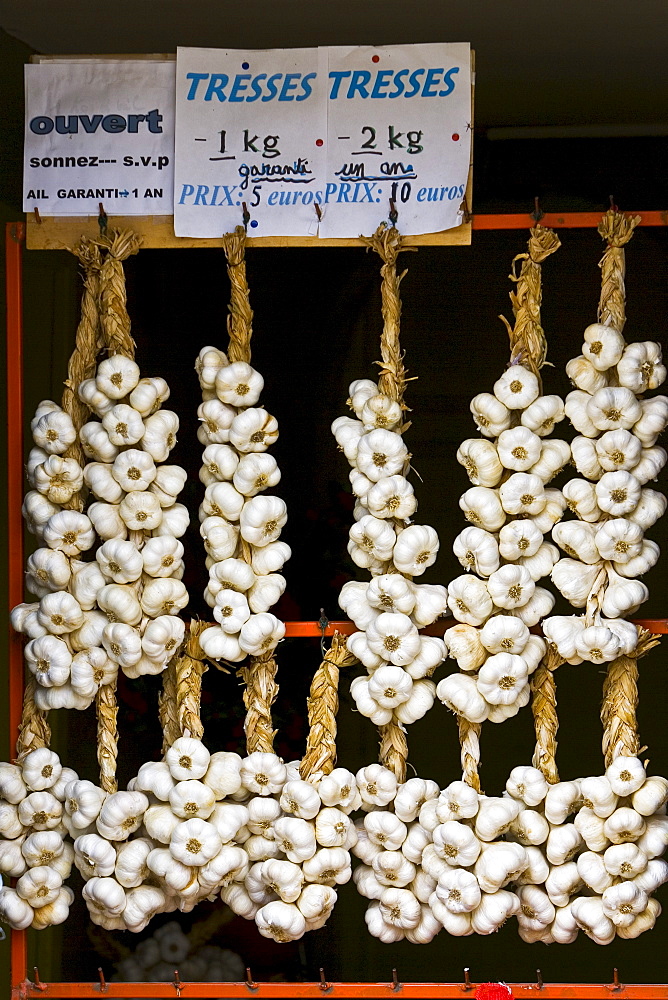 Plaits of garlic for sale, Bastide d'Armagnac, France