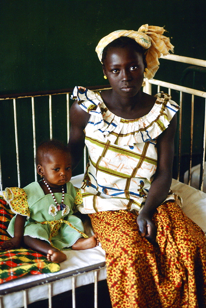 Young mother  with her child in hospital, Gambia