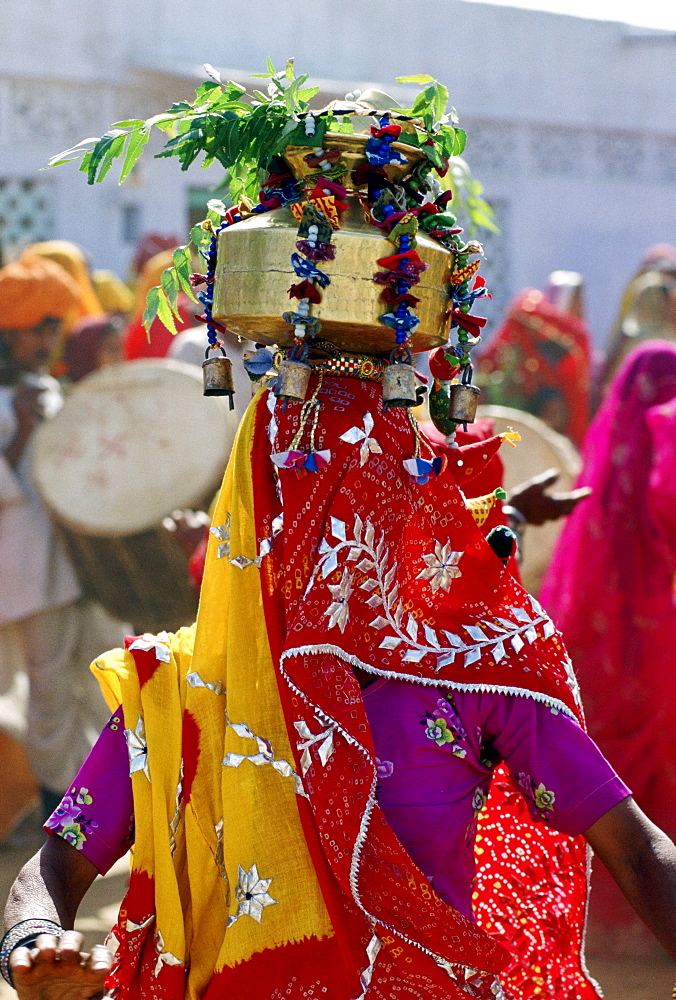 Veiled dancer at a festival in Nalu Village, Rajasthan, India.